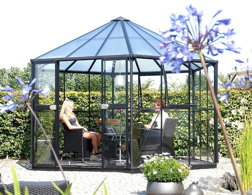 Alternative Uses for Your Greenhouse People sit in greenhouse #2